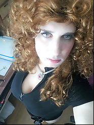 Fascinating tranny chick is getting naked on pics